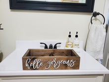 Load image into Gallery viewer, A rustic brown wooden rectangular tray with white script lettering that reads 'hello gorgeous' sits on a white bathroom vanity counter. A black faucet, soap dispensers, and a white towel are visible in the background.
